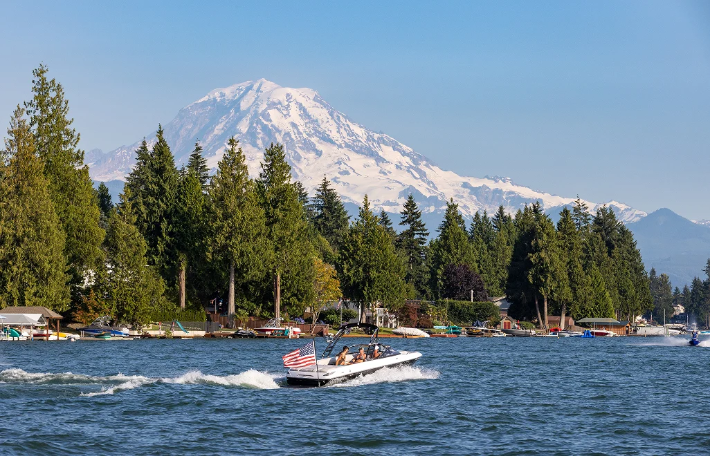 Boat on Lake Tapps with Mount Rainier in the background
