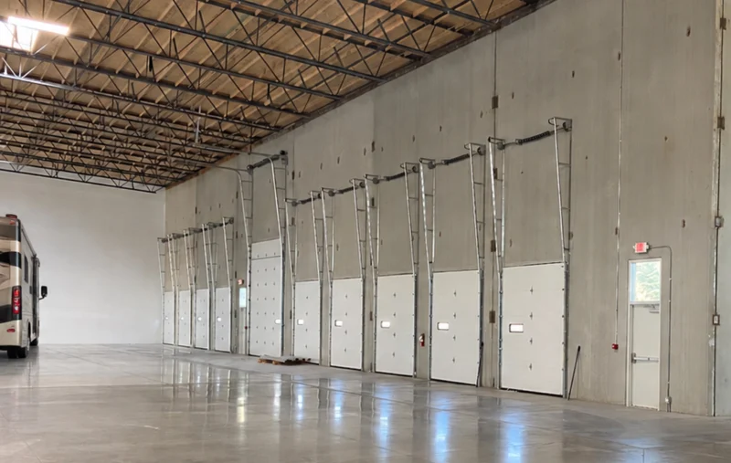 Interior storage bays with roll-up doors